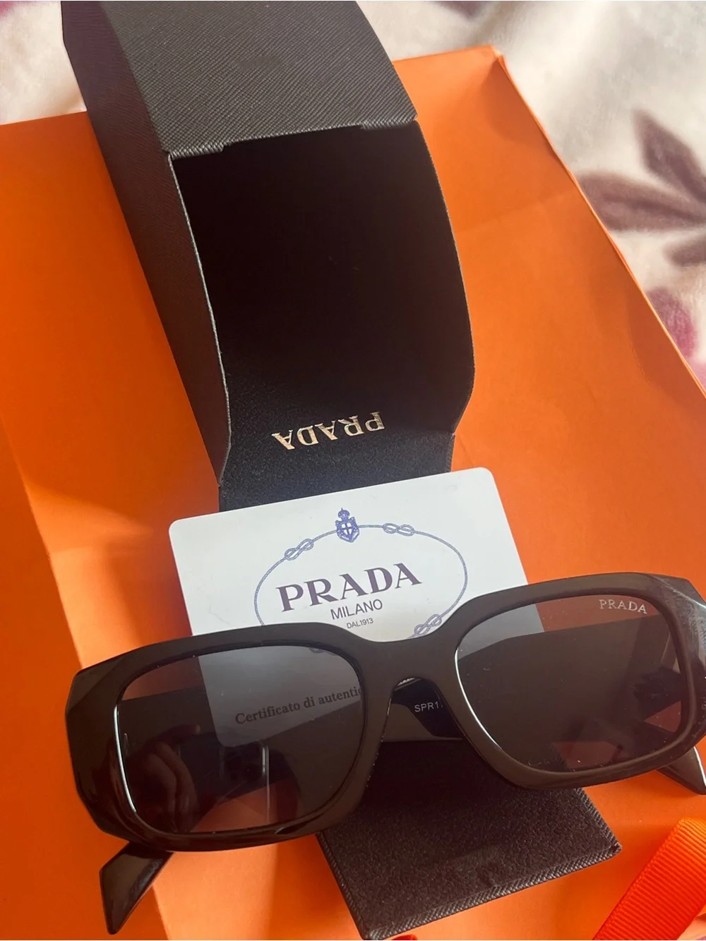Prada Glossy Black Faceted Frame Sunglasses